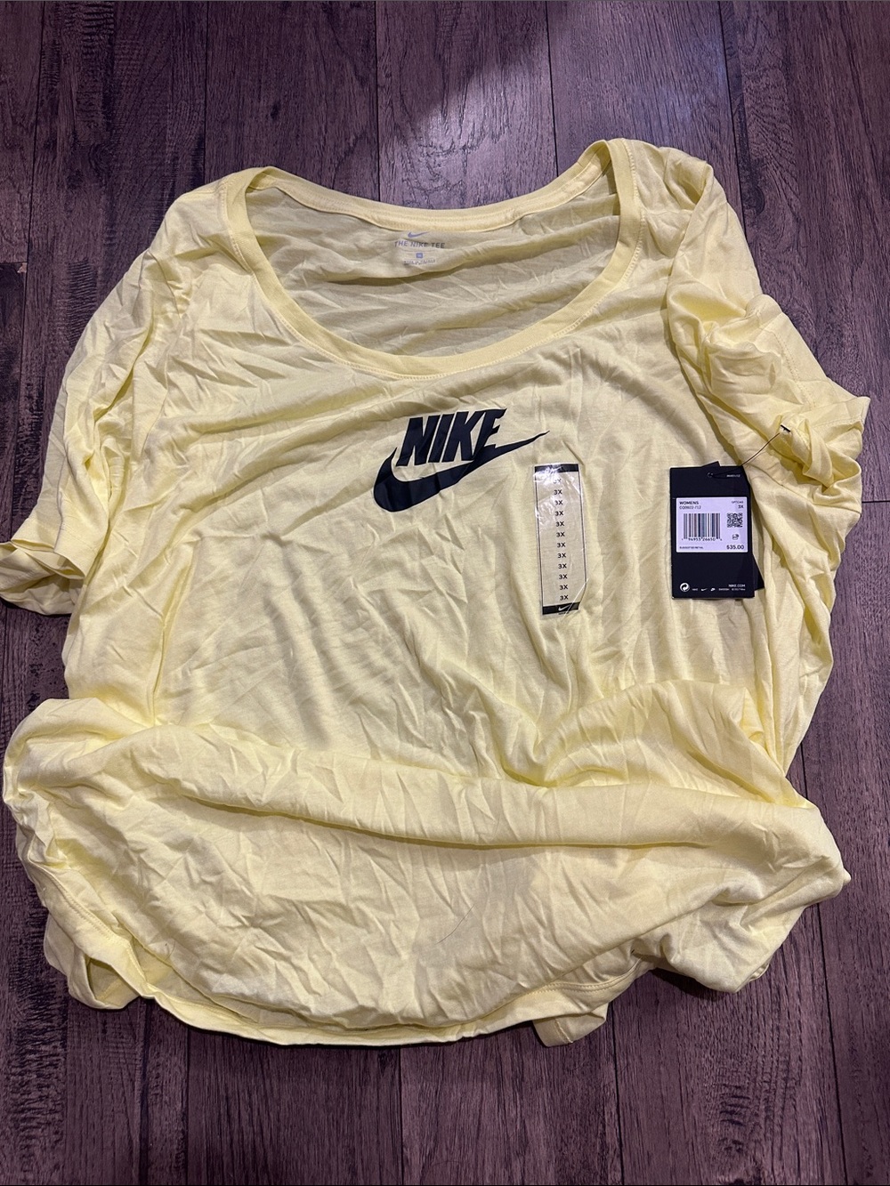 Nike Women’s Light Yellow Scoop Neck Tee with Black Logo
